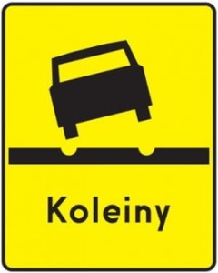 Znak T-13 - Tabliczka wskazująca odcinek drogi, na którym występują deformacje nawierzchni w postaci kolein -I Generacja 600x750mm